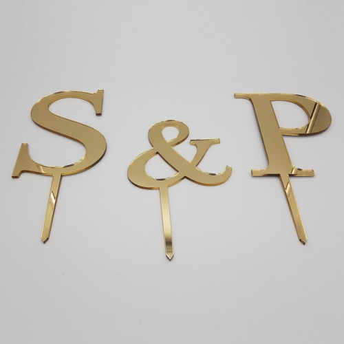 złote litery w formie topperów.jpg