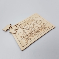 drewniane puzzle z logo przedszkola.jpg