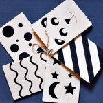 Drewniane tabliczki kontrastowe dla dzieci – pomoc sensoryczna